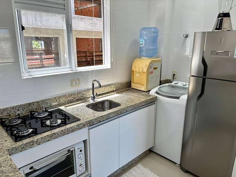 L036 | Apartamento com churrasqueira perto do mar.